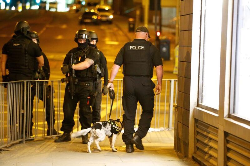 Armed police officers near the Manchester Arena. Reuters