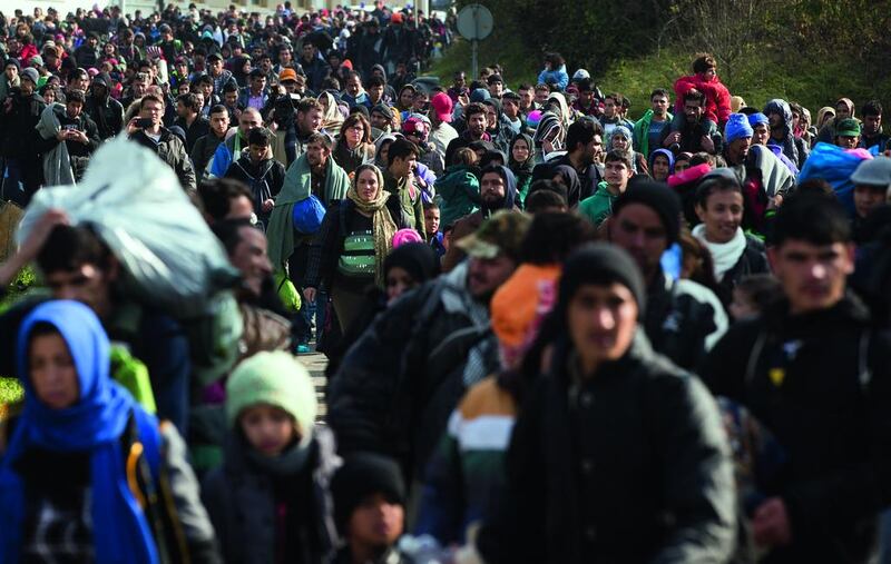 Migrants walk towards Austria in Sentilj, Slovenia, in October 2015. AP