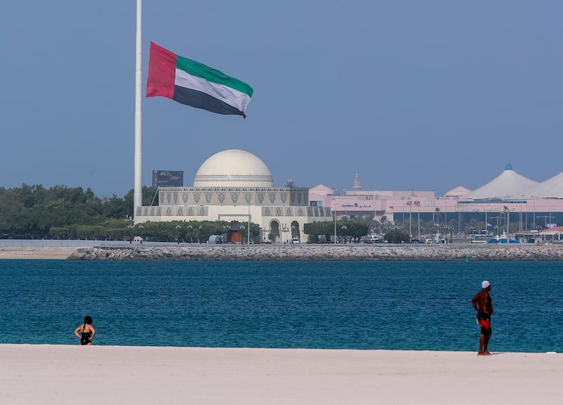 The UAE flag at Abu Dhabi Corniche is flown at half-mast to mark the death of Sheikh Saeed bin Zayed, the Representative of the Ruler of Abu Dhabi. Victor Besa / The National