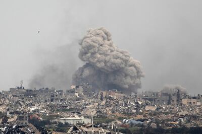 Smoke rises over the Gaza Strip as seen from a position on the Israeli side of the border. Getty Images