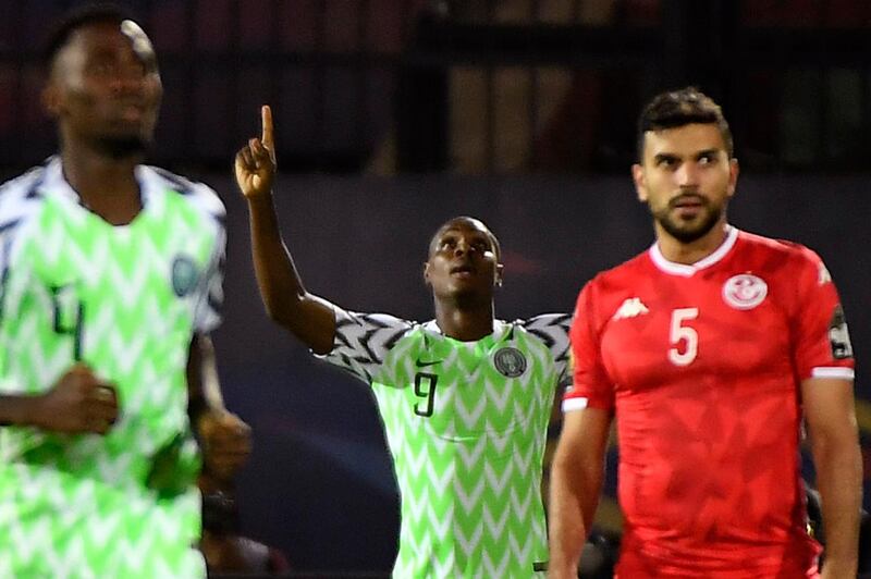 Ighalo celebrates what proved to be the only goal of the game against Tunisia. AFP