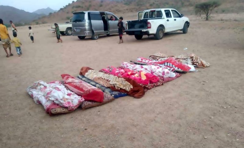 The bodies of seven girls who drowned in a pond in Abyan province, southern Yemen, are laid out for burial.
