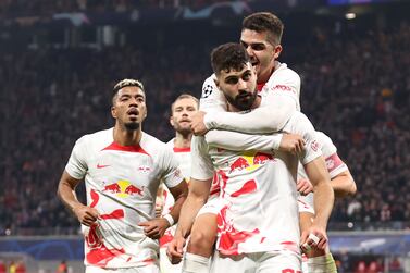 LEIPZIG, GERMANY - FEBRUARY 22: Josko Gvardiol of RB Leipzig celebrates with teammates after scoring the team's first goal during the UEFA Champions League round of 16 leg one match between RB Leipzig and Manchester City at Red Bull Arena on February 22, 2023 in Leipzig, Germany. (Photo by Lars Baron / Getty Images)