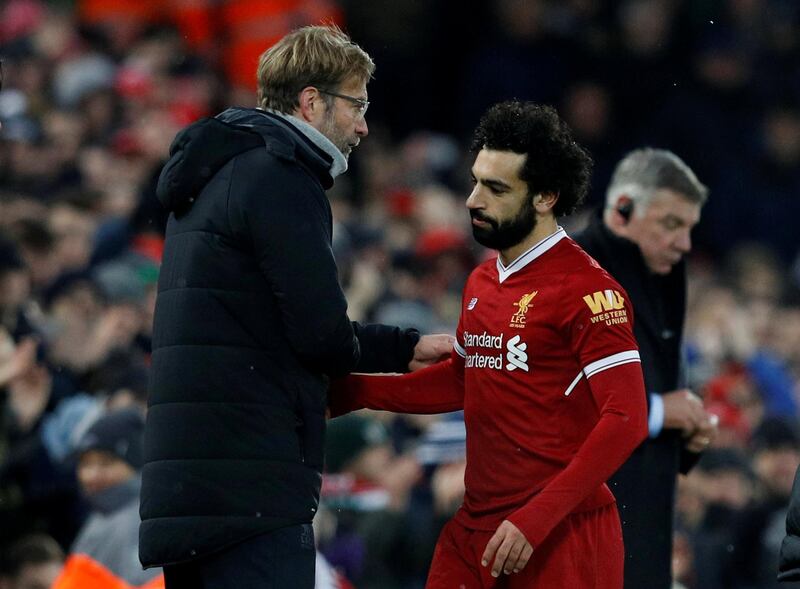 Soccer Football - Premier League - Liverpool vs Everton - Anfield, Liverpool, Britain - December 10, 2017   Liverpool's Mohamed Salah hugs Liverpool manager Juergen Klopp as he is substituted off while Everton manager Sam Allardyce looks on              REUTERS/Phil Noble    EDITORIAL USE ONLY. No use with unauthorized audio, video, data, fixture lists, club/league logos or "live" services. Online in-match use limited to 75 images, no video emulation. No use in betting, games or single club/league/player publications. Please contact your account representative for further details.