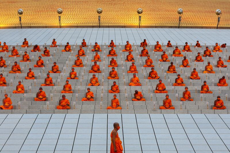 Buddhist monks pray at a ceremony commemorating Makha Bucha Day in Pathum Thani province outside Bangkok. Reuters