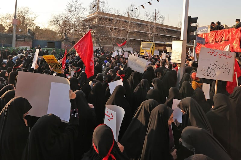 Iranian protesters chant slogans in front of the British embassy in the capital Tehran on January 12, 2020 following the British ambassador's arrest for allegedly attending an illegal demonstration. Chanting "Death to Britain", up to 200 protesters rallied outside the mission a day after the brief arrest of British ambassador Rob Macaire at a memorial for those killed when a Ukraine airliner was shot down. AFP