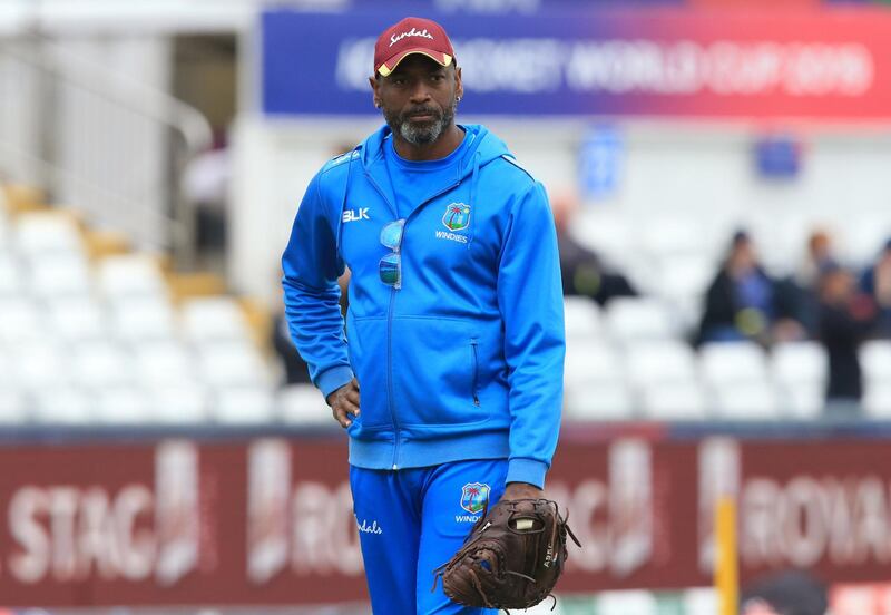 West Indies' head coach Floyd Reifer looks on as his players warm up ahead of the 2019 Cricket World Cup group stage match between Sri Lanka and West Indies at the Riverside Ground, in Chester-le-Street, northeast England, on July 1, 2019. (Photo by Lindsey Parnaby / AFP) / RESTRICTED TO EDITORIAL USE
