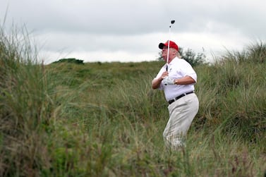 Donald Trump plays a round of golf at The Trump International Golf Links Course in Scotland. Getty Images