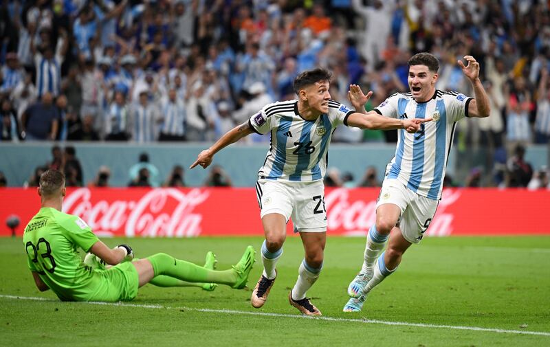 Nahuel Molina celebrates after scoring for Argentina in the first half. Getty