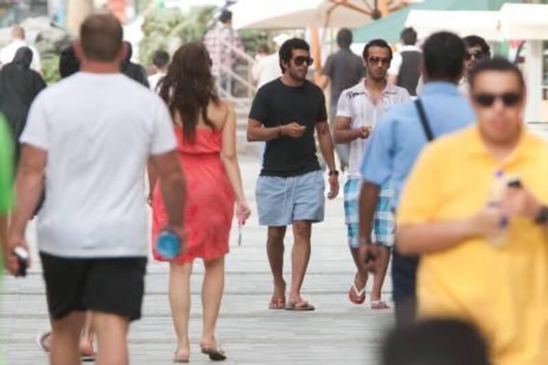 UAE - Dubai - April 05- 2011: People walking at " The Walk " at JBR.  ( Jaime Puebla - The National Newspaper )