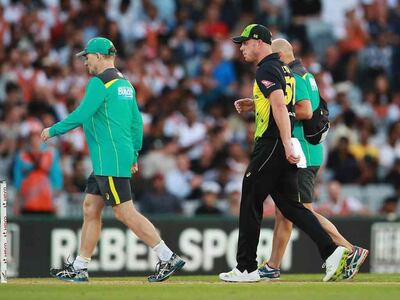 Chris Lynn of Australia walks off injured during the International Twenty20 Tri-Series final against New Zealand at Eden Park. Hannah Peters/Getty Images