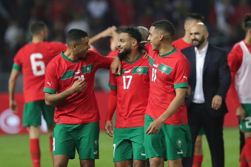 Left to right: Morocco's Walid Cheddira, Sofiane Boufal and Abdelhamid Sabiri celebrate after the match. AP
