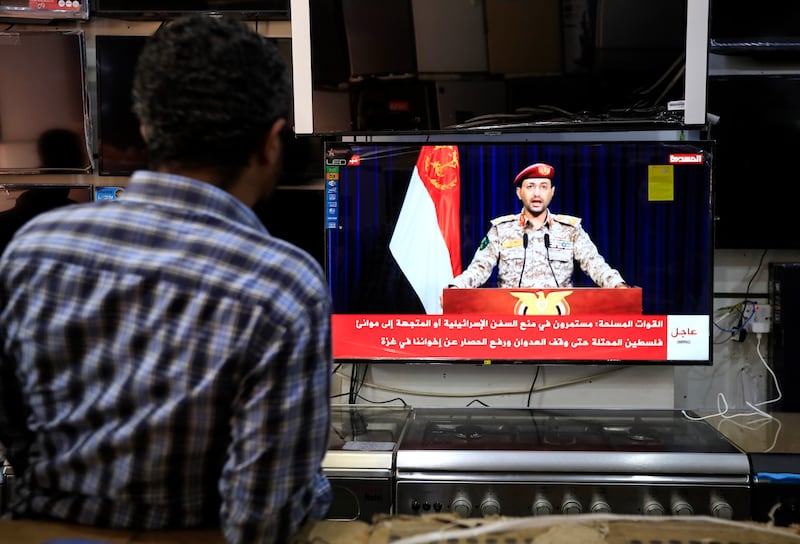 A televised statement by the Houthis' military spokesman Yahya Sarea in Sanaa, Yemen, after a large-scale missile and drone attack by the group against  shipping lanes in the Red Sea. EPA