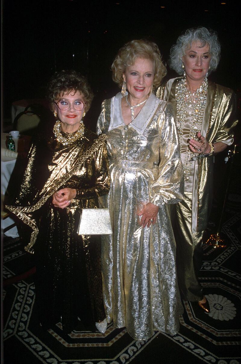 Betty White, in a metallic gold gown, with Estelle Getty and Beatrice Arthur at the 'Night of 100 Stars' recording on May 5, 1990, at Radio City Music Hall. Shutterstock