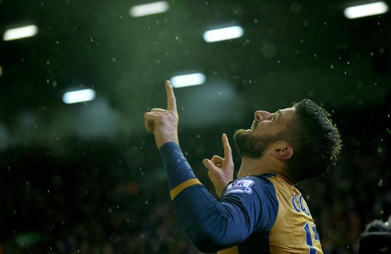 Arsenal’s striker Olivier Giroud of France celebrates scoring the fifth goal making the score 3-2 during the English Premier League soccer match between Liverpool and Arsenal at Anfield, Liverpool, Britain, 13 January 2016.  EPA/PETER POWELL