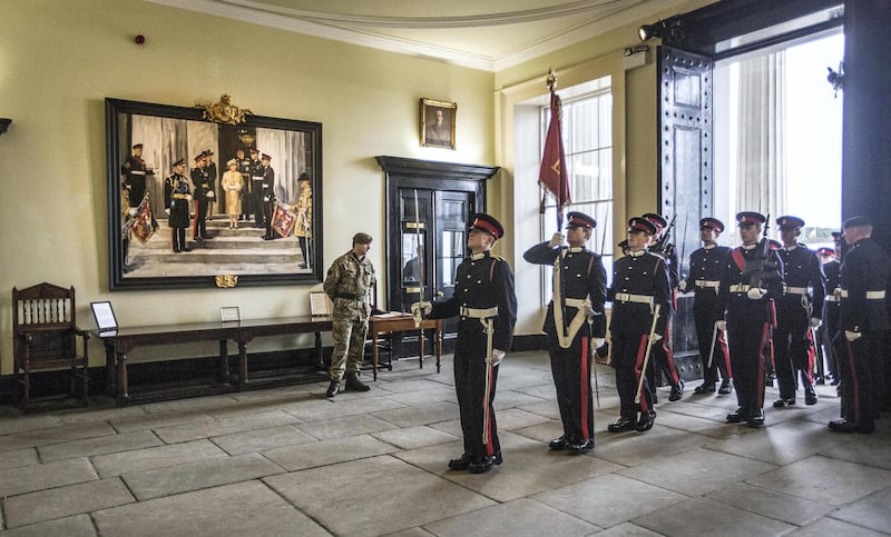 CAMBERLEY, ENGLAND - DECEMBER 11:  Graduating Sandhurst cadets march into the academy following the conclusion of the sovereigns parade which marks the occasion that they graduate and become officers in the British and foreign armies at Royal Military Academy Sandhurst on December 11, 2015 in Camberley, England. The Sovereign's Parade takes place in the Old College Square at Sandhurst's Royal Military Academy at the end of each term and marks the passing out of Officer Cadets who have completed the commissioning course. The Prince of Wales previously attended when each of his sons passed out.  (Photo by Richard Pohle- WPA Pool/Getty Images)