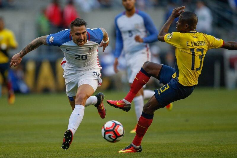 Geoff Cameron #20 of the United States battles Enner Valencia #13 of Ecuador during the 2016 Quarterfinal - Copa America Centenario match at CenturyLink Field on June 16, 2016 in Seattle, Washington. Otto Greule Jr/Getty Images/AFP