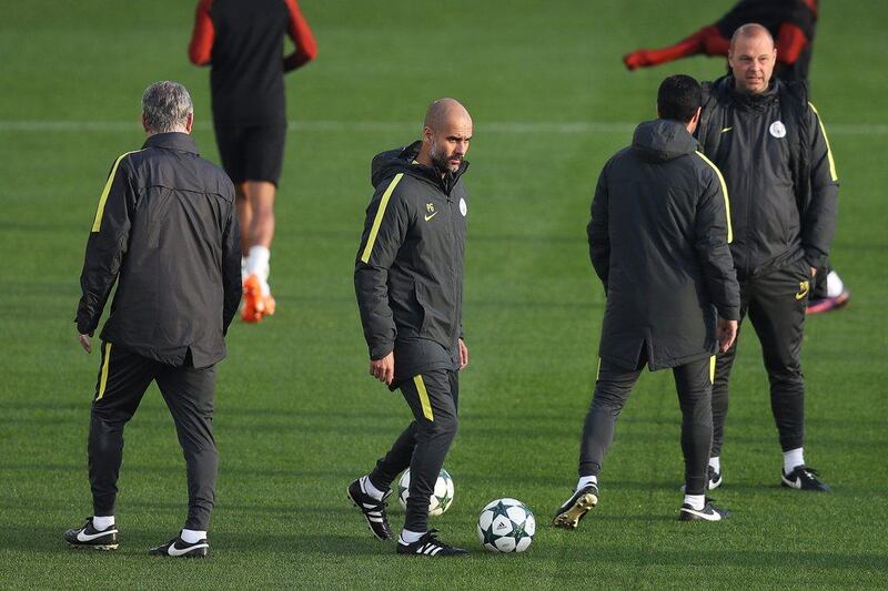 Manchester City manager Pep Guardiola conducts his team’s training session. Chris Brunskill / Getty Images