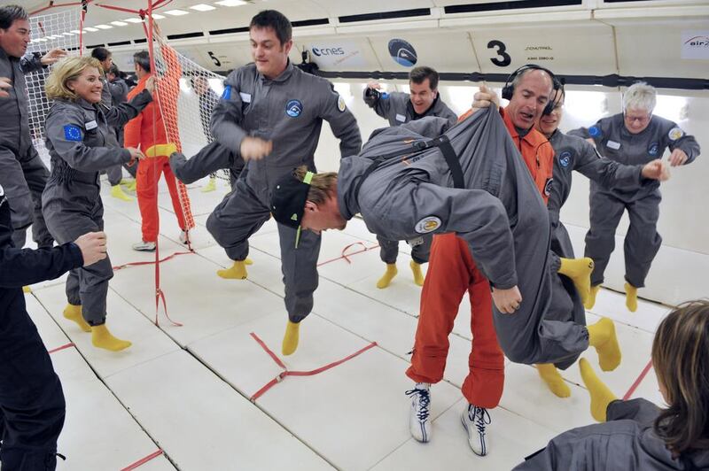 Customers enjoy the first zero-gravity flight for paying passengers, in Europe last year. The service will come to the UAE in April. Mehdi Fedouach / AFP