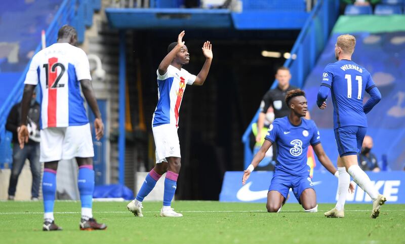 Palace's Tyrick Mitchell pleads his innocence after a penalty was awarded for his trip on Tammy Abraham that led to Chelsea's third goal. Getty