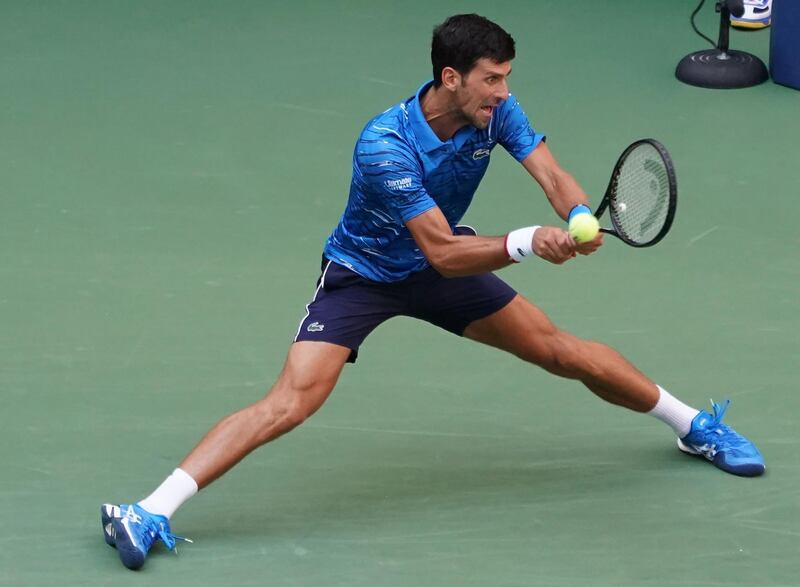 Novak Djokovic of Serbia warms up before playing against Roberto Carballes Baena of Spain. AFP