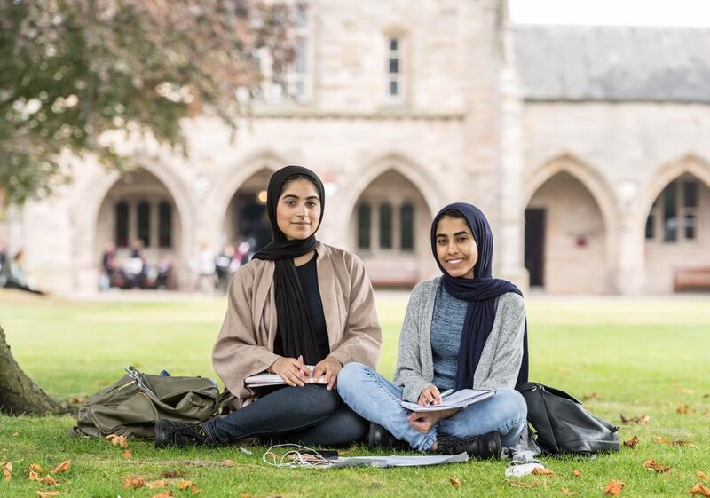 Rouda Almaazmi, left, from Sharjah, and Fatma Al Addouli, from Dubai, at the University of Aberdeen, where they are pre-med students. Graham Dargie for The National