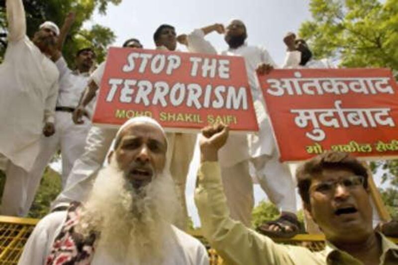 Indian Muslims raise anti-terrorism slogans during a protest against recent explosions across India, in New Delhi, India.