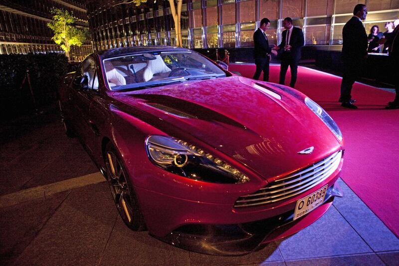 Aston Martin is the car of choice of 007 James Bond, and one was up for auction during the charity gala at the Armani Hotel. Razan Alzayani / The National