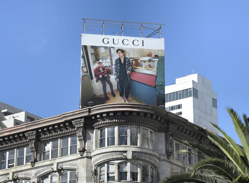 SAN FRANCISCO, CALIFORNIA - SEPTEMBER 12, 2018: An advertising billboard promoting the Gucci clothing brand is mounted on top of a building in Union Square, in San Francisco, California. (Photo by Robert Alexander/Getty Images)