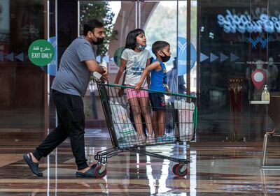 Abu Dhabi residents at the Khalidiyah Mall on June 19th, 2021. Abu Dhabi has temporarily suspended its green pass scheme while a technical fault with Al Hosn app is resolved. Victor Besa / The National.