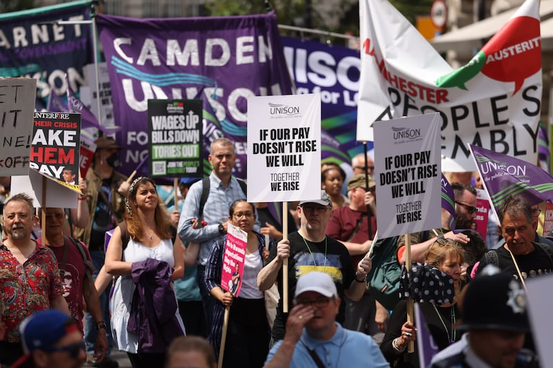 Demonstrators during a rally in June calling for wage increases for workers to help them cope with the cost-of-living crisis. Getty Images