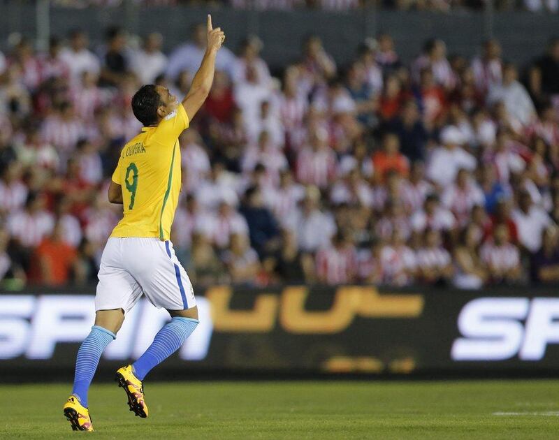 Brazil’s Ricardo Oliveira celebrates his goal against Paraguay during a World Cup qualifying match in Asuncion, Paraguay Tuesday, March 29, 2016. (AP Photo/Jorge Saenz)