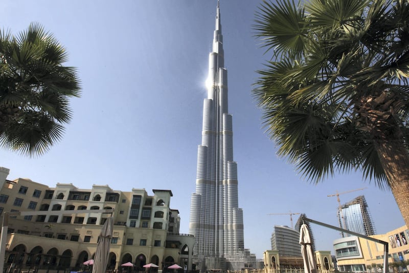 DUBAI, UNITED ARAB EMIRATES - JANUARY 26:  A general view of the Burj Khalifa in Dubai on January 26, 2010. The Burj Khalifa, formerly known as Burj Dubai, is the tallest man-made structure ever built, at 828 m (2,717 ft). Construction began on 21 September 2004, with the exterior of the structure completed on 1 October 2009. The building officially opened on 4 January 2010.
 (Randi Sokoloff / The National)  For Travel  *** Local Caption ***  RS005-012610-BURJ-K.jpg