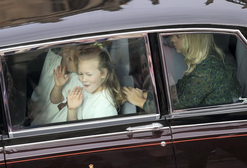 WINDSOR, ENGLAND - OCTOBER 12: Bridesmaid Savannah Phillips arrives ahead of the wedding of Princess Eugenie of York and Mr. Jack Brooksbank at St. George's Chapel on October 12, 2018 in Windsor, England. (Photo by Aaron Chow - WPA Pool/Getty Images)