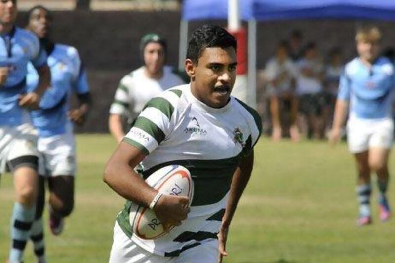 Jumeirah College's Matthew Travers, centre, impressed during the Dubai College 10s tournament in the Under18 group.