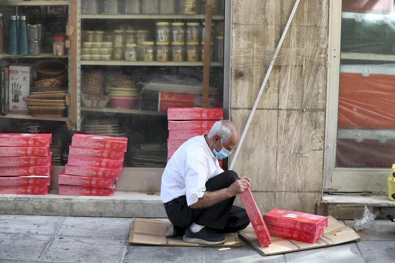 Dubai, United Arab Emirates - Reporter: N/A. News. Coronavirus/Covid-19. A man sorts out his stock in Bur Dubai. Saturday, October 17th, 2020. Dubai. Chris Whiteoak / The National