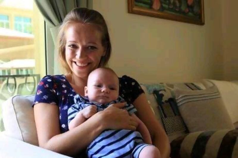 Katherine Wightman with her son Harry. She believes that making more time for her husband is simply not an option with a very young baby but, having been through it all before, she says she knows things will improve.
