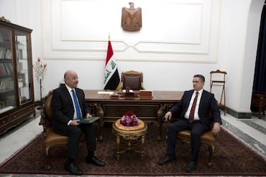 Iraq's President Barham Salih meets with new prime minister designate Adnan Al Zurfi in Baghdad, Iraq on March 17, 2020. The Presidency of the Republic of Iraq Office Handout via Reuters