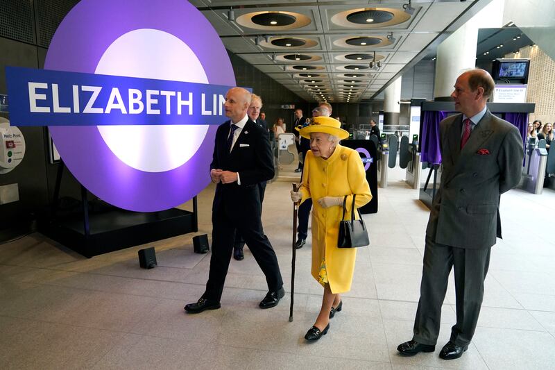 Britain's Queen Elizabeth II and her son Prince Edward, Earl of Wessex on Tuesday visited Paddington Station in London to mark the completion of London's Crossrail project and the opening of new 'Elizabeth Line' rail service next week. AFP