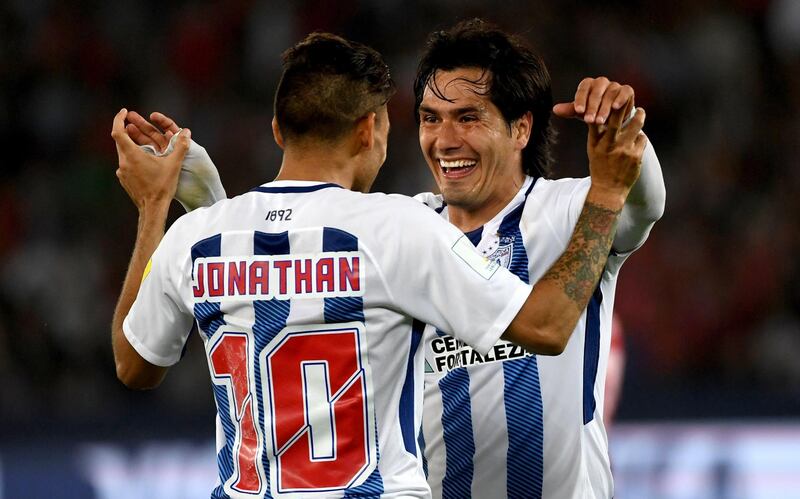 epa06379241 Jonathan Urretaviscaya and Jorge Hernandez of CF Pachuca celebrate the winning goal by Victor Guzman in the extra time of the FIFA Club World Cup match between CF Pachuca and Wydad Casablanca in Abu Dhabi, UAE, 09 December 2017.  EPA/MARTIN DOKOUPIL