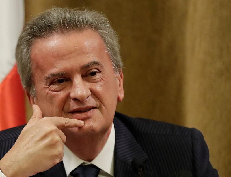 (FILES) In this file photo taken on November 11, 2019 Lebanon's Central Bank Governor Riad Salameh gestures during a press conference at the bank's headquarters in Beirut on November 11, 2019. Riad Salame and four of his relatives are targeted by a complaint in France from the NGO Sherpa and a Lebanese collective who accuse them of having illegally hidden suspected funds in Europe, the two associations announced on May 3, 2021.  / AFP / JOSEPH EID
