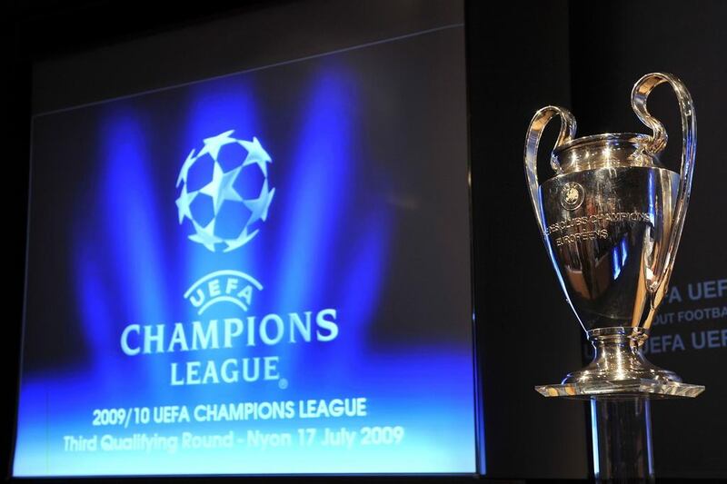 The Uefa Champions League trophy, the prize all 32 teams will be vying for. Fabrice Coffrini / AFP