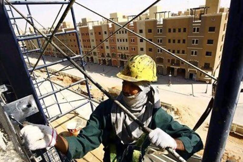 A labourer works on Dar Al Arkan's Al Qasr project in Riyadh. Reuters