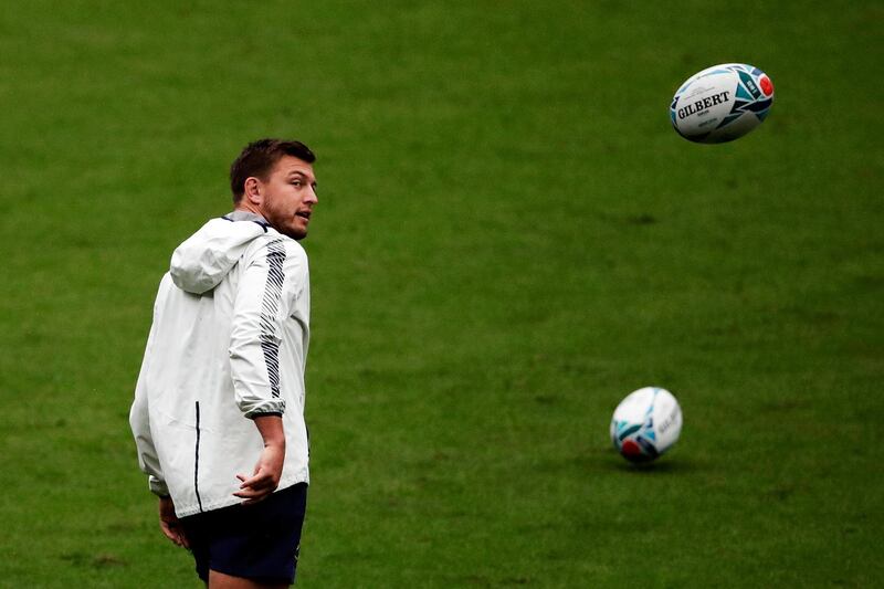 South Africa's Handre Pollard eyes the ball during training as he prepares for Sunday's semi-final against Wales. AP Photo