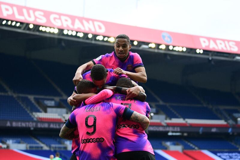 Paris Saint-Germain's Argentinian forward Mauro Icardi celebrates the winner with teammates. AFP