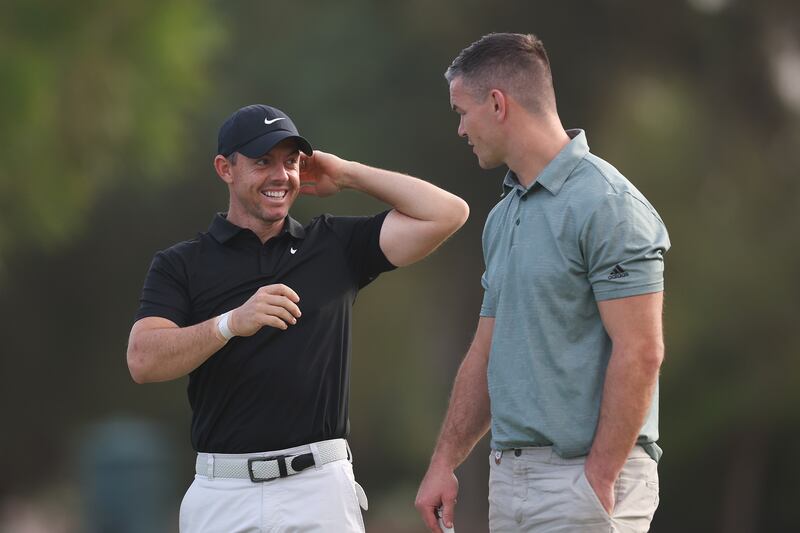 Rory McIlroy with teammate Johnny Sexton. Getty Images