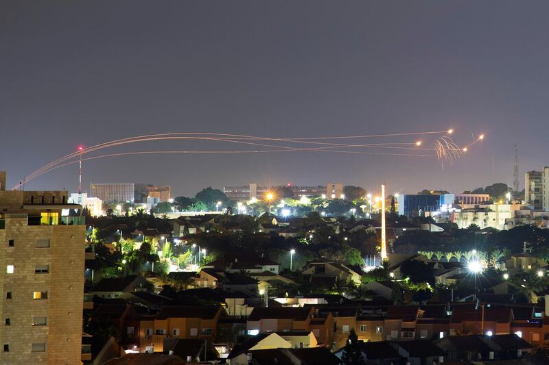 An Iron Dome anti-missile system fires interception missiles as rockets are launched from Gaza towards Israel, as seen from the city of Ashkelon, Israel. REUTERS