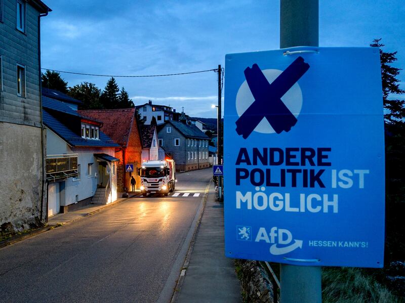 A campaign poster for German right-wing party AfD in Oberreifenberg near Frankfurt, which reads 'different politics is possible'. AP