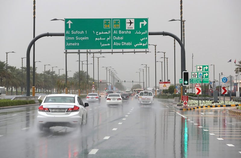 DUBAI, UNITED ARAB EMIRATES , March 22 – 2020 :- Traffic during the rain on King Salman Bin Abdulaziz Al Saud street in Dubai. (Pawan Singh / The National) For News/Online/Instagram. 