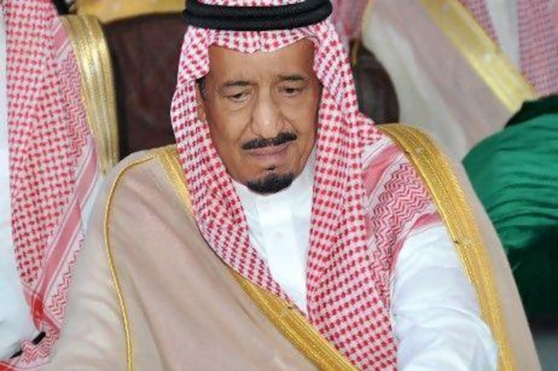 Saudi Prince Salman reacts as Crown Prince Nayef's coffin arrives at Jeddah airport. Prince Salman has been named heir apparent to 89-year-old King Abdullah following Prince Nayef's death.